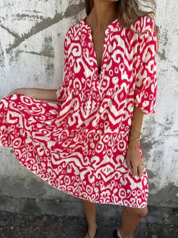 Linda™ | Dröm dig bort i boho-chic charm med denna luftiga midiklänning