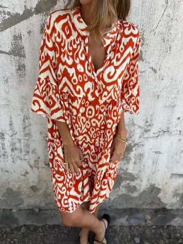 Linda™ | Dröm dig bort i boho-chic charm med denna luftiga midiklänning
