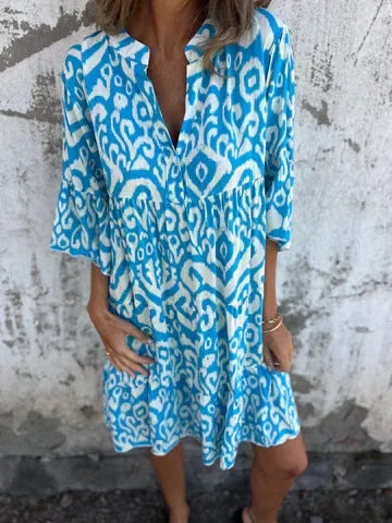 Linda™ | Dröm dig bort i boho-chic charm med denna luftiga midiklänning