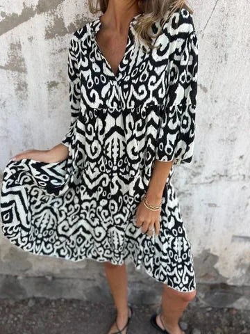 Linda™ | Dröm dig bort i boho-chic charm med denna luftiga midiklänning