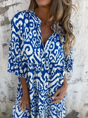 Linda™ | Dröm dig bort i boho-chic charm med denna luftiga midiklänning