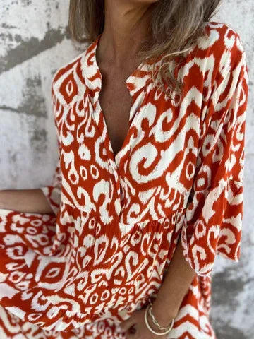 Linda™ | Dröm dig bort i boho-chic charm med denna luftiga midiklänning