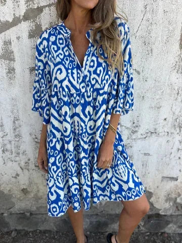 Linda™ | Dröm dig bort i boho-chic charm med denna luftiga midiklänning